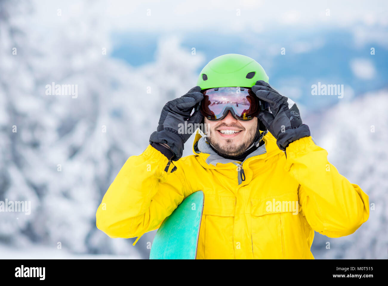 Man wearing sports glasses outdoors Stock Photo