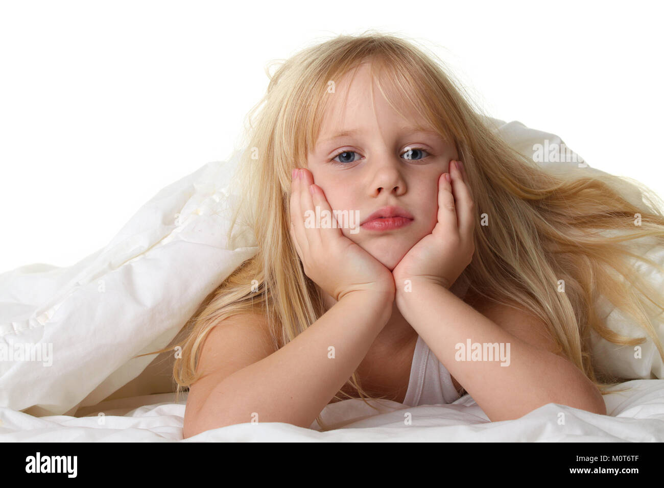 Bedtime child in bed with white blanket Stock Photo Alamy