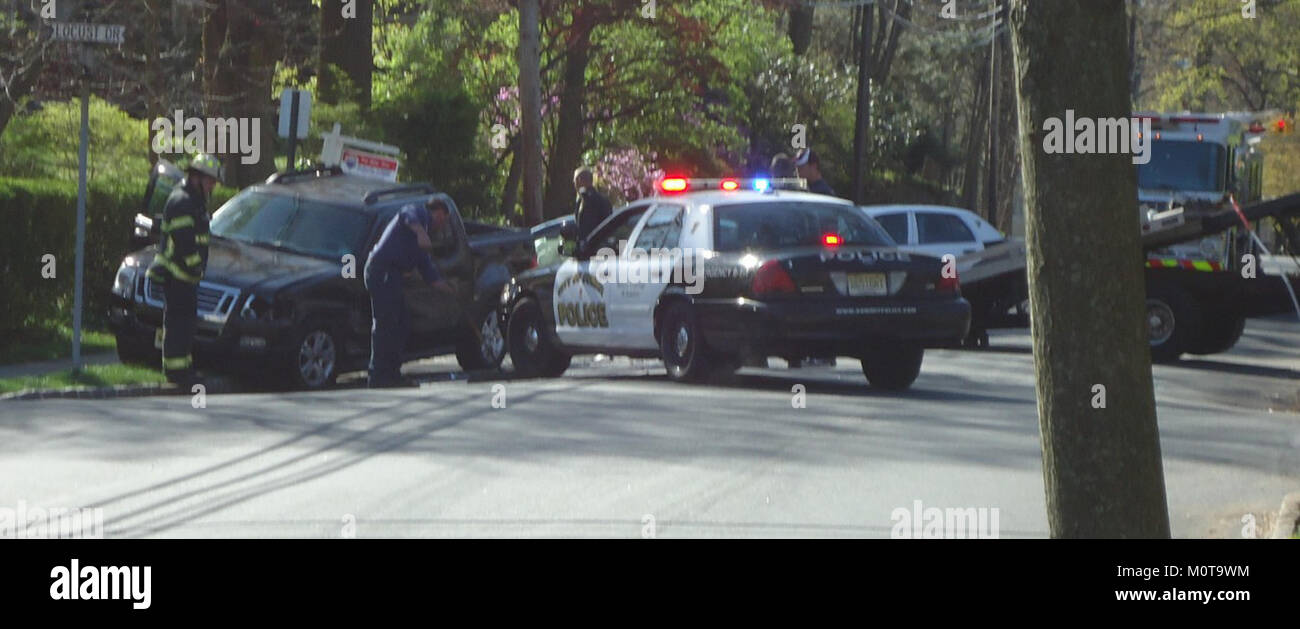 A car crash scene showing a police presence, with no reported injuries ...