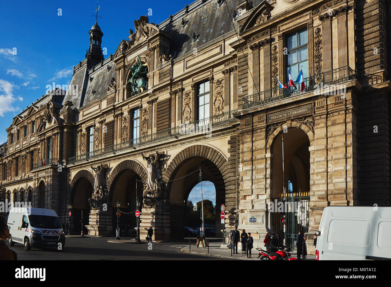 Paris,France - October 3 2017 : Traffic road on street near Louvre Pyramid at Musee du Louvre or the Grand Louvre Museum . Stock Photo