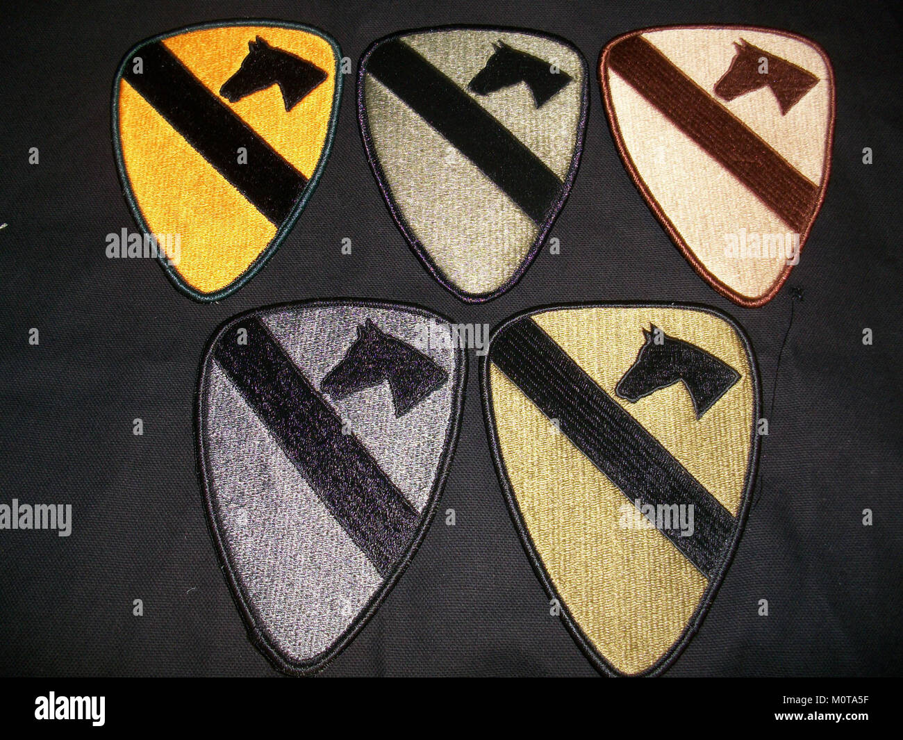 CAV patches, dated May 11, 2002, feature distinctive military insignia used by the Cavalry units of the U.S. Army. Stock Photo