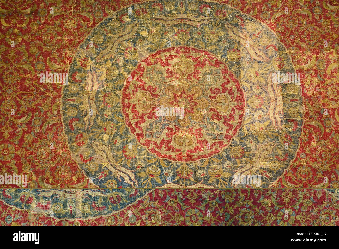 This historical carpet, originating from Cairo during the Ottoman ...