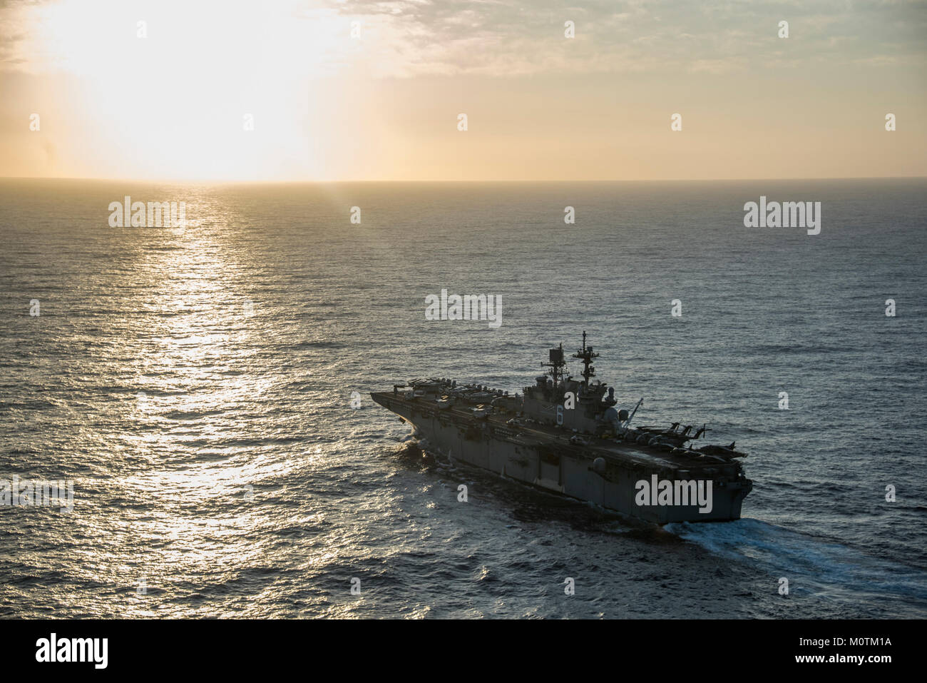 Amphibious assault ship USS America (LHA 6) transits the Pacific Ocean near Nimitz-class aircraft carrier USS Carl Vinson (CVN 70). Carl Vinson Strike Group is currently operating in the Pacific as part of a regularly scheduled deployment. Stock Photo