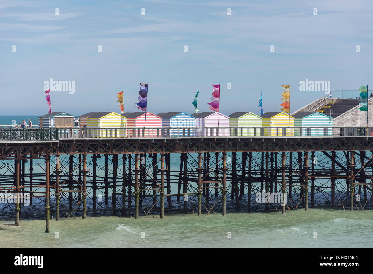 Beach huts on Hastings Pier, Hastings, East Sussex, England, United Kingdom Stock Photo