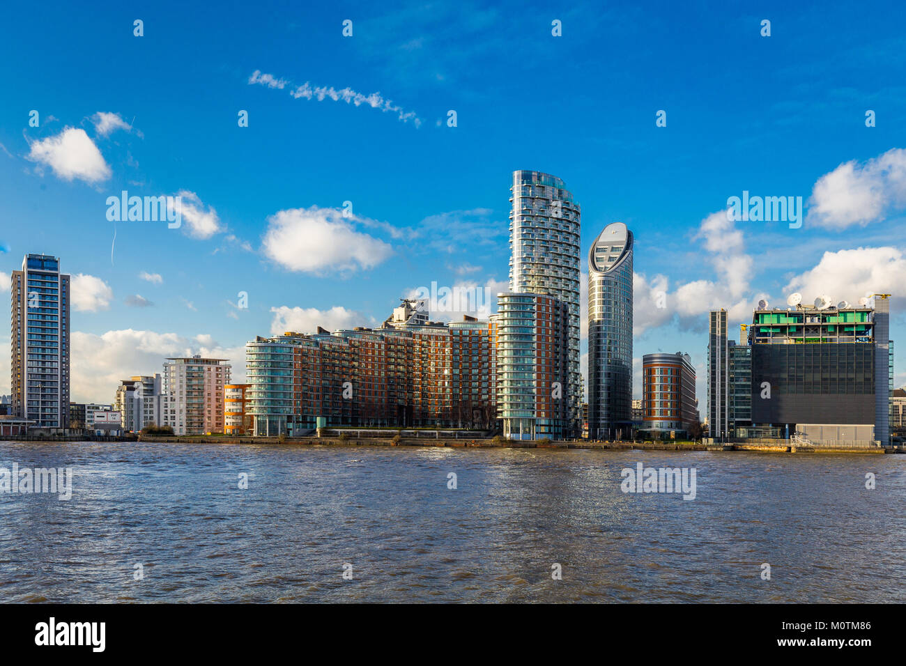 New residential towers alongside the Thames and Thomson Reuters corporate offices in East London, Greenwich, January 2018 Stock Photo