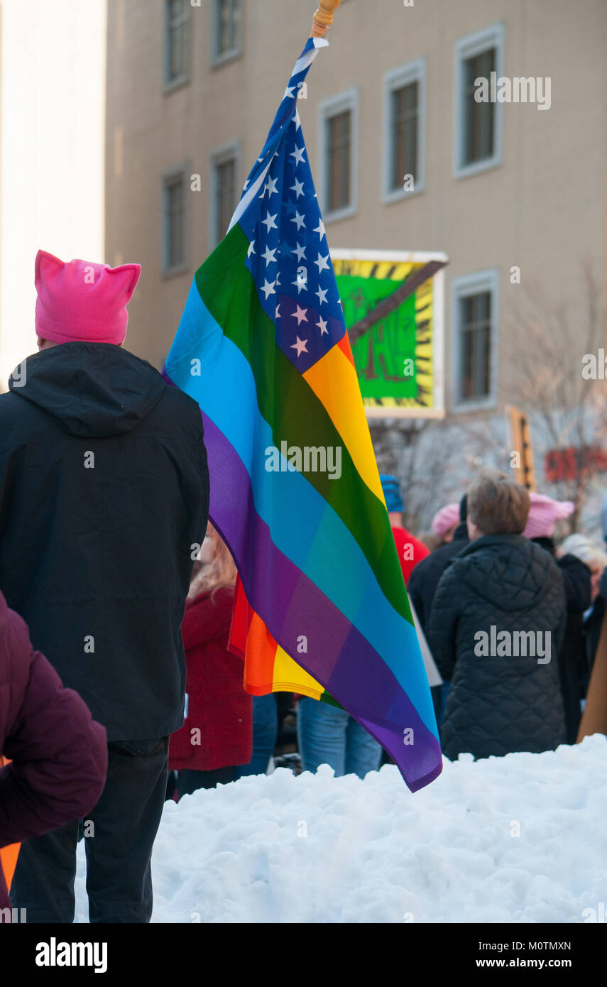 An LGBT flag proudly flies at the Women's March / rally in Dayton, Ohio on January 20th 2018. Stock Photo