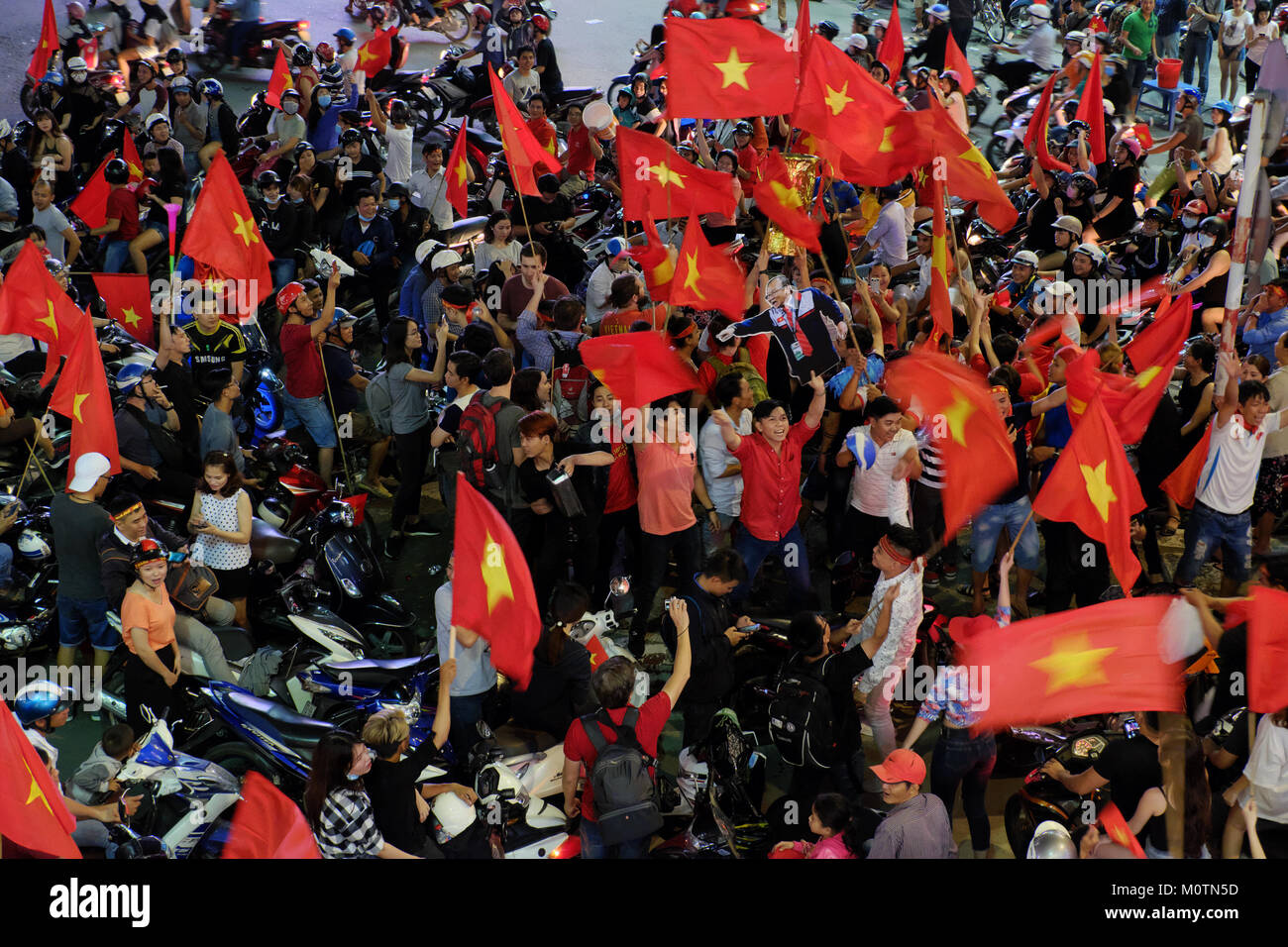 HO CHI MINH CITY, VIET NAM, Crowd of Vietnamese football supporter down