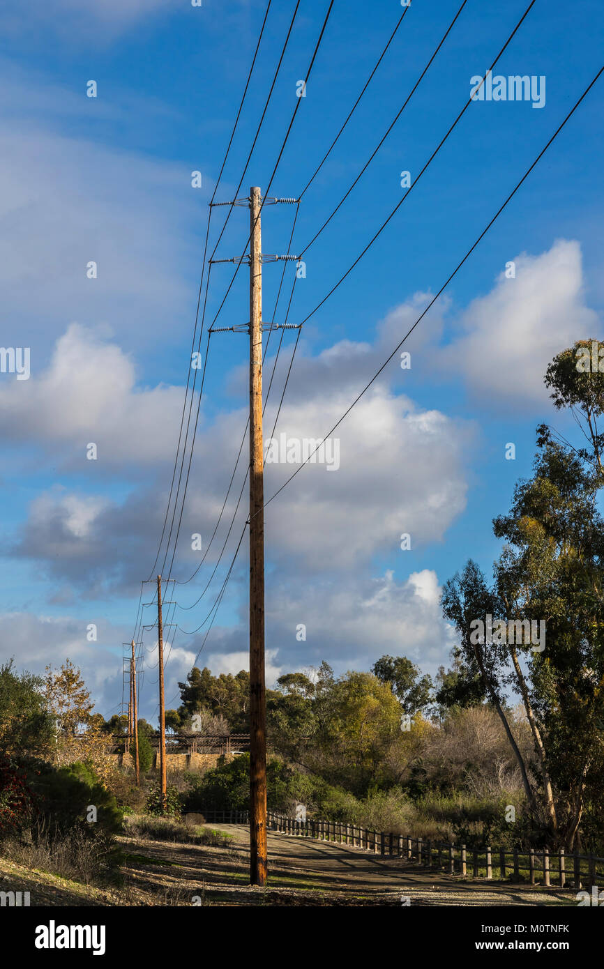 high voltage power lines and poles Stock Photo - Alamy