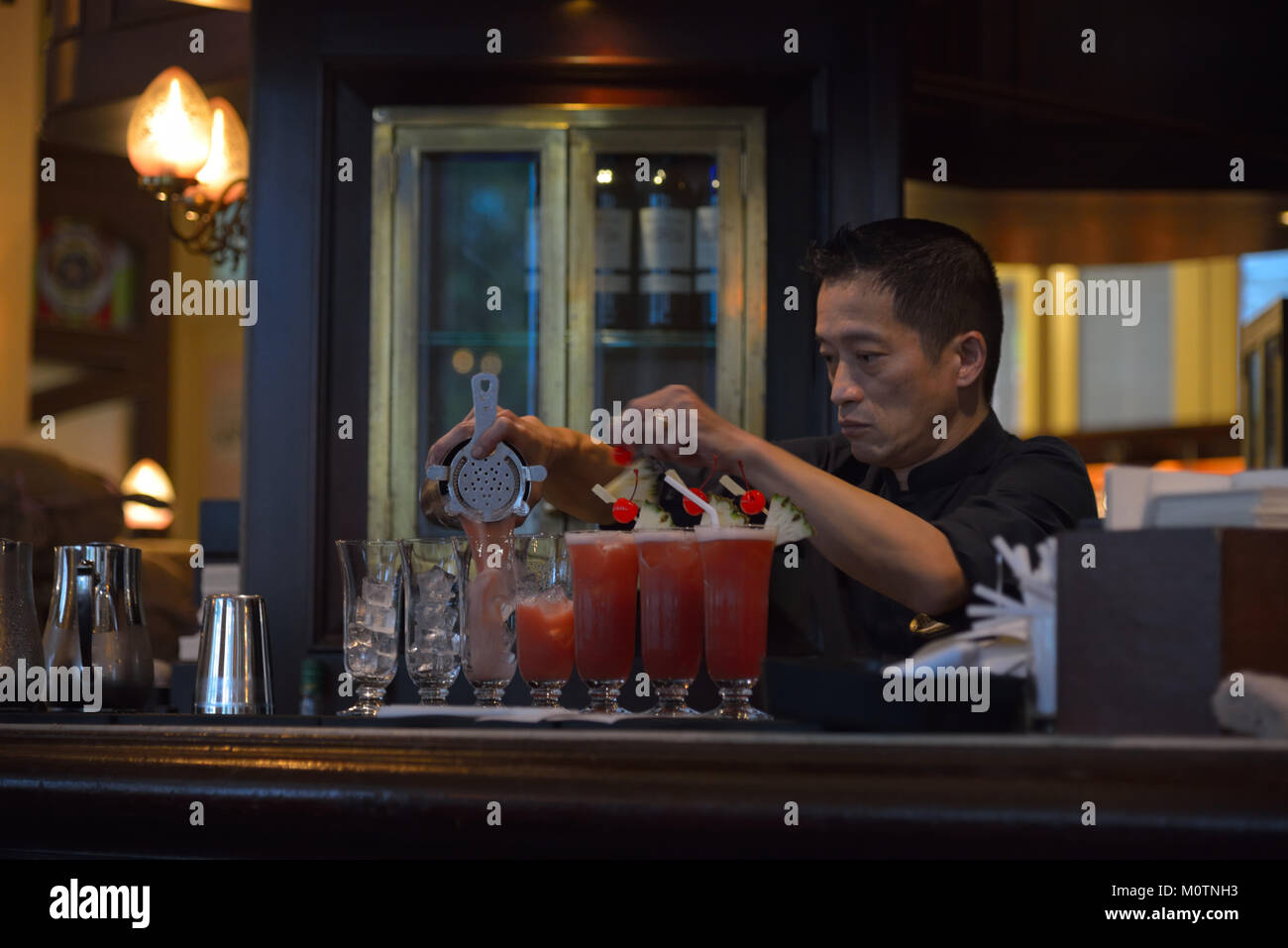 The original Singapore Sling at the Long Bar, The Raffles Hotel SIN Stock Photo