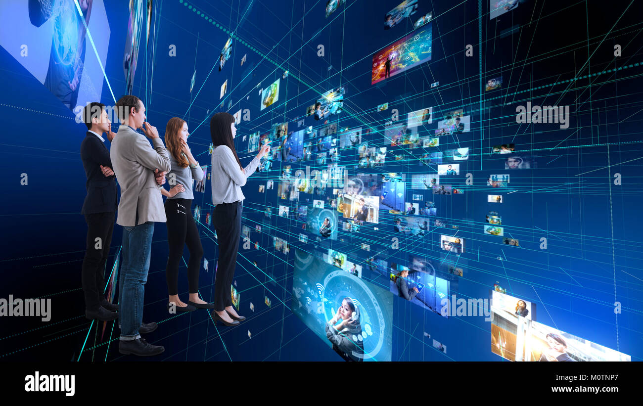 Group of people using futuristic interface. IoT(Internet of Things). ICT(Information Communication Network). Social media. Stock Photo