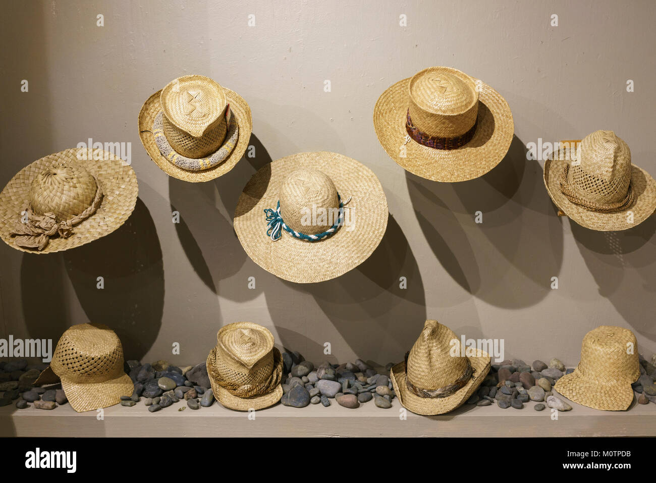 Hand made lauhala hats on display in Hawaii as art objects Stock Photo