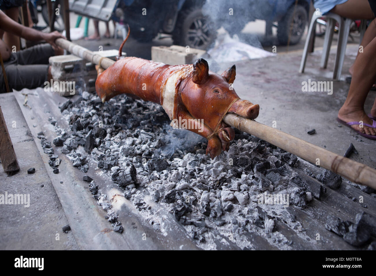 Spit Roasted Pig known as Lechon Baboy in the Philippines is a National Favourite food. Stock Photo