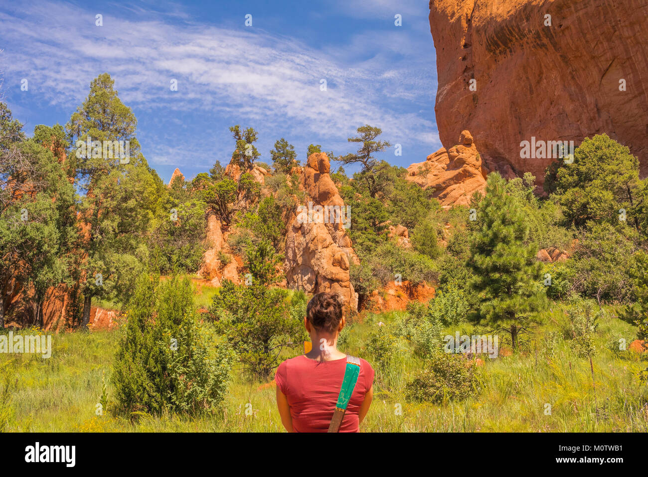 Woman taking photos in the Garden of the Gods park, Colorado Springs, Colorado, USA Stock Photo
