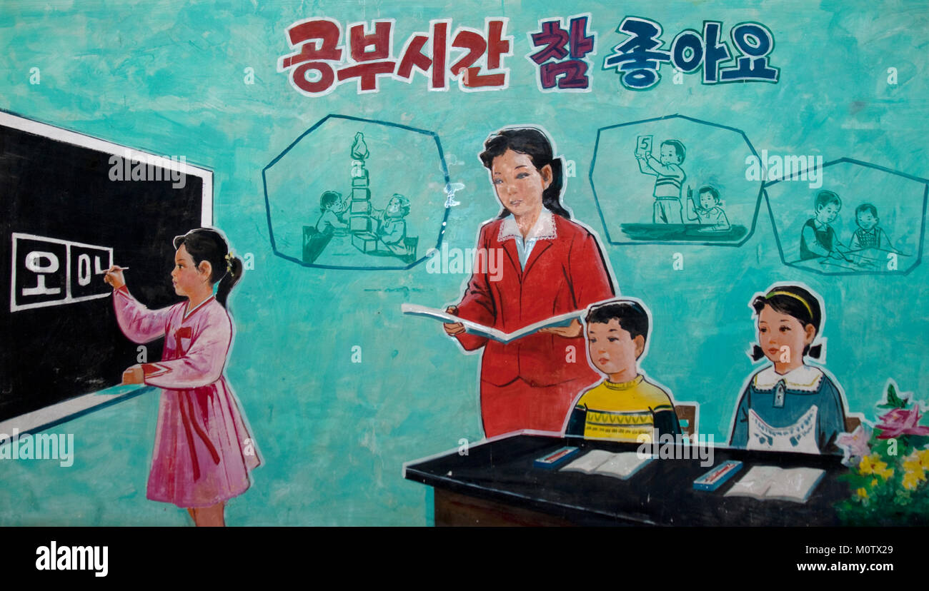 Propaganda poster in a North Korean school about good education, North