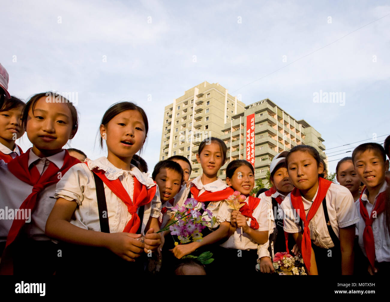 Smiling and laughing group of North Korean pioneers in