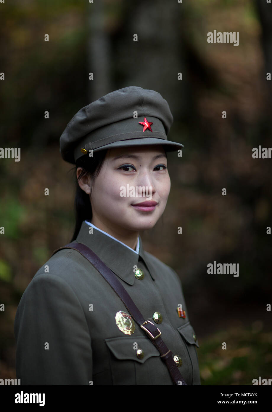 Portrait of a cute North Korean guide in military style uniform, Ryanggang Province, Chongbong, North Korea Stock Photo