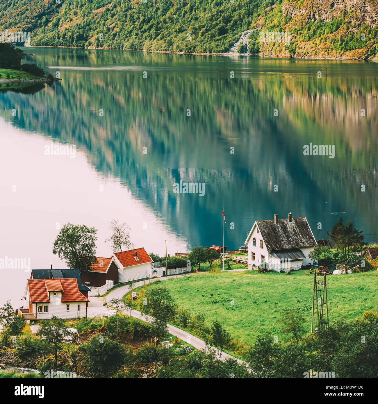 Image showcasing Top View Of Scandinavian Houses In Norwegian Village On Shore Of The ...