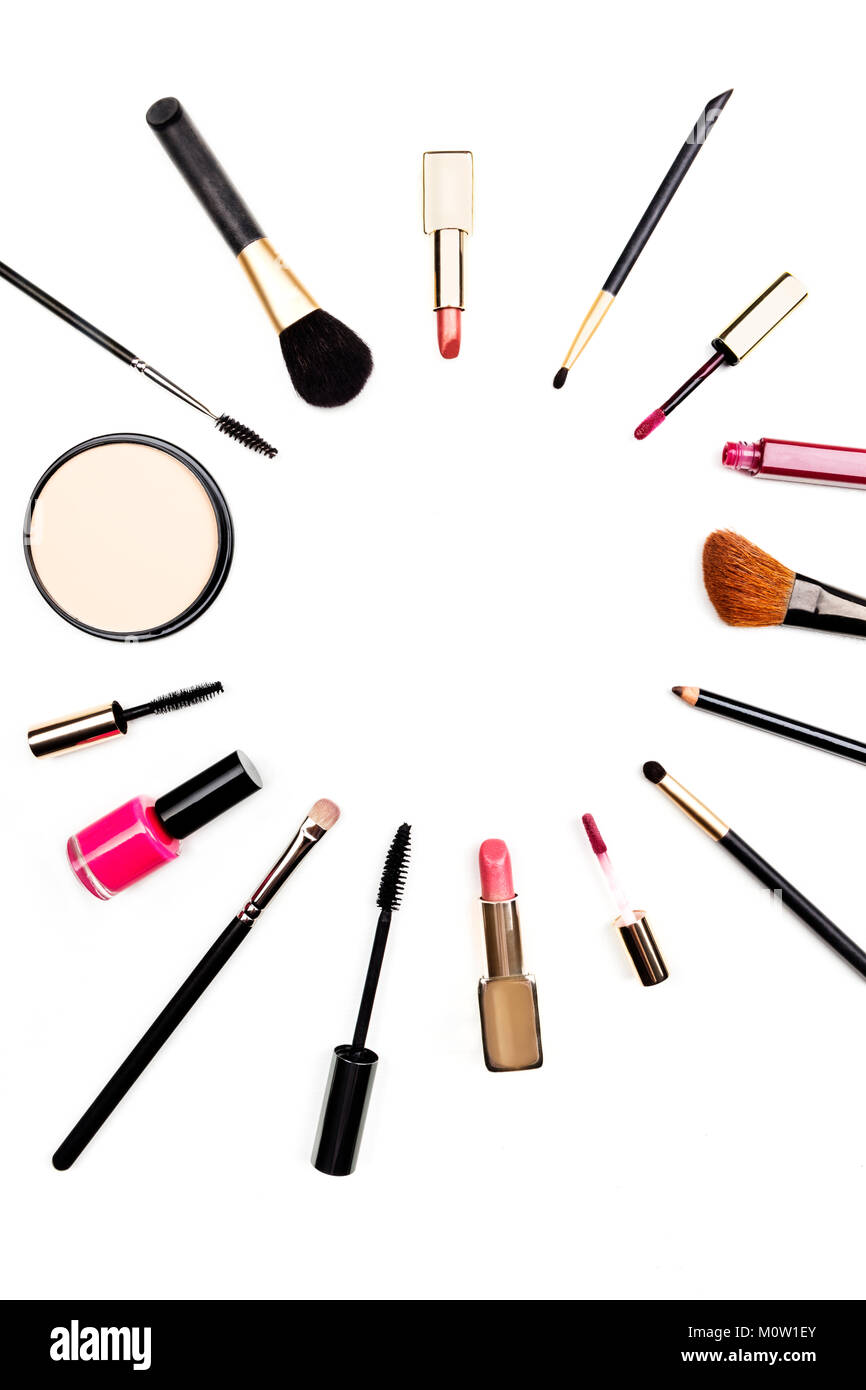 Makeup accessories forming frame with copy space on white Stock Photo