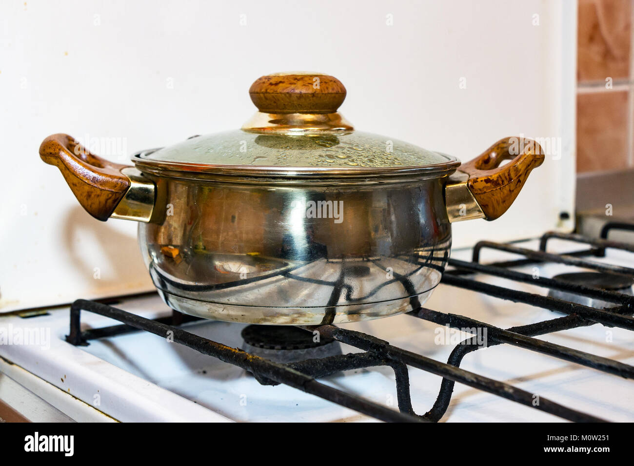 Pot on a gas stove Stock Photo Alamy