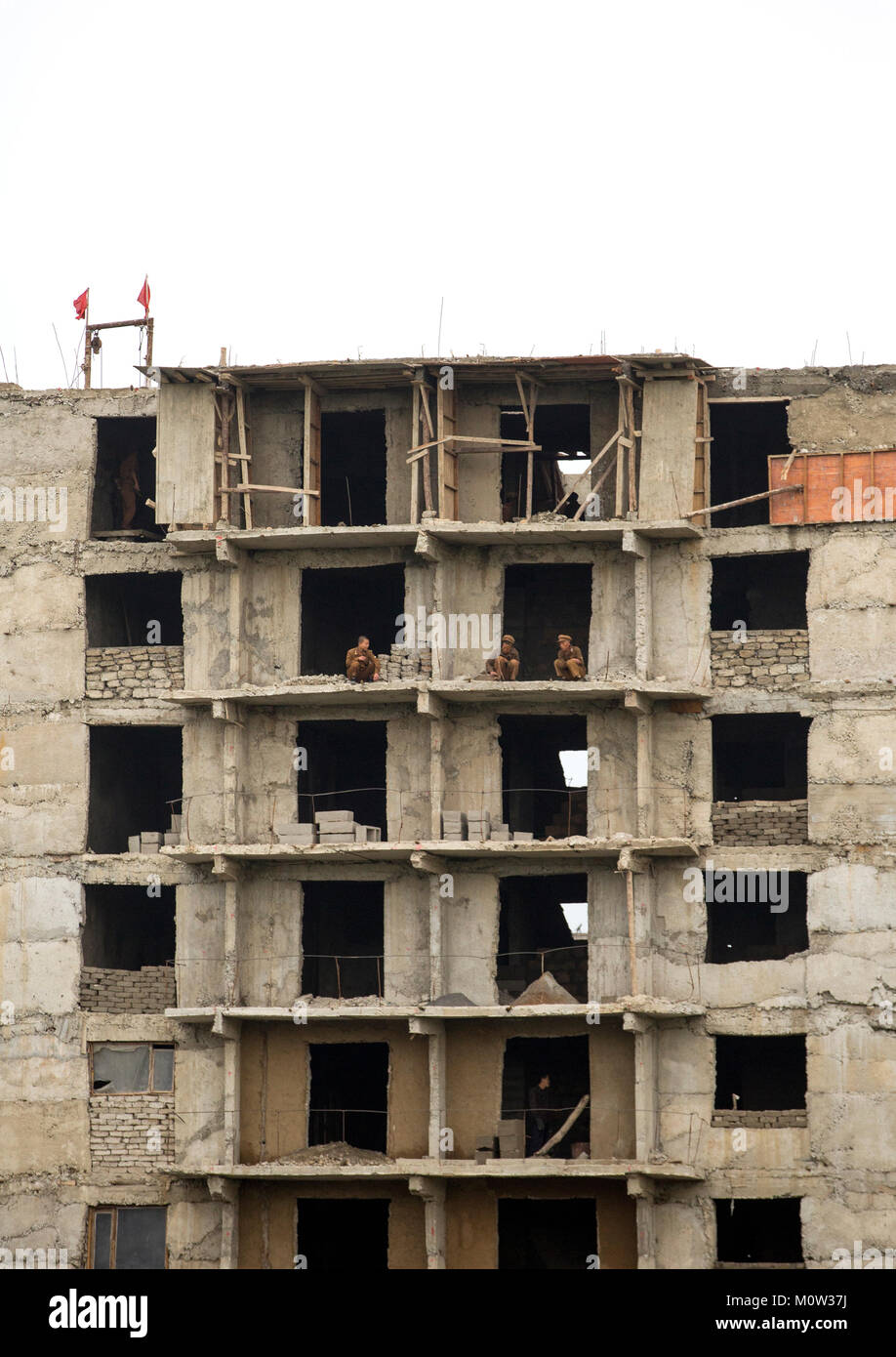 North Korean soldiers working as construction workers in a building