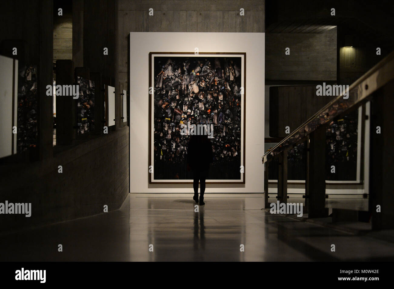 A visitor looks at Hamm, Bergwerk Ost by Andreas Gursky, at the Hayward Gallery in London after the gallery reopens with a major retrospective of work by the German photographer. Stock Photo