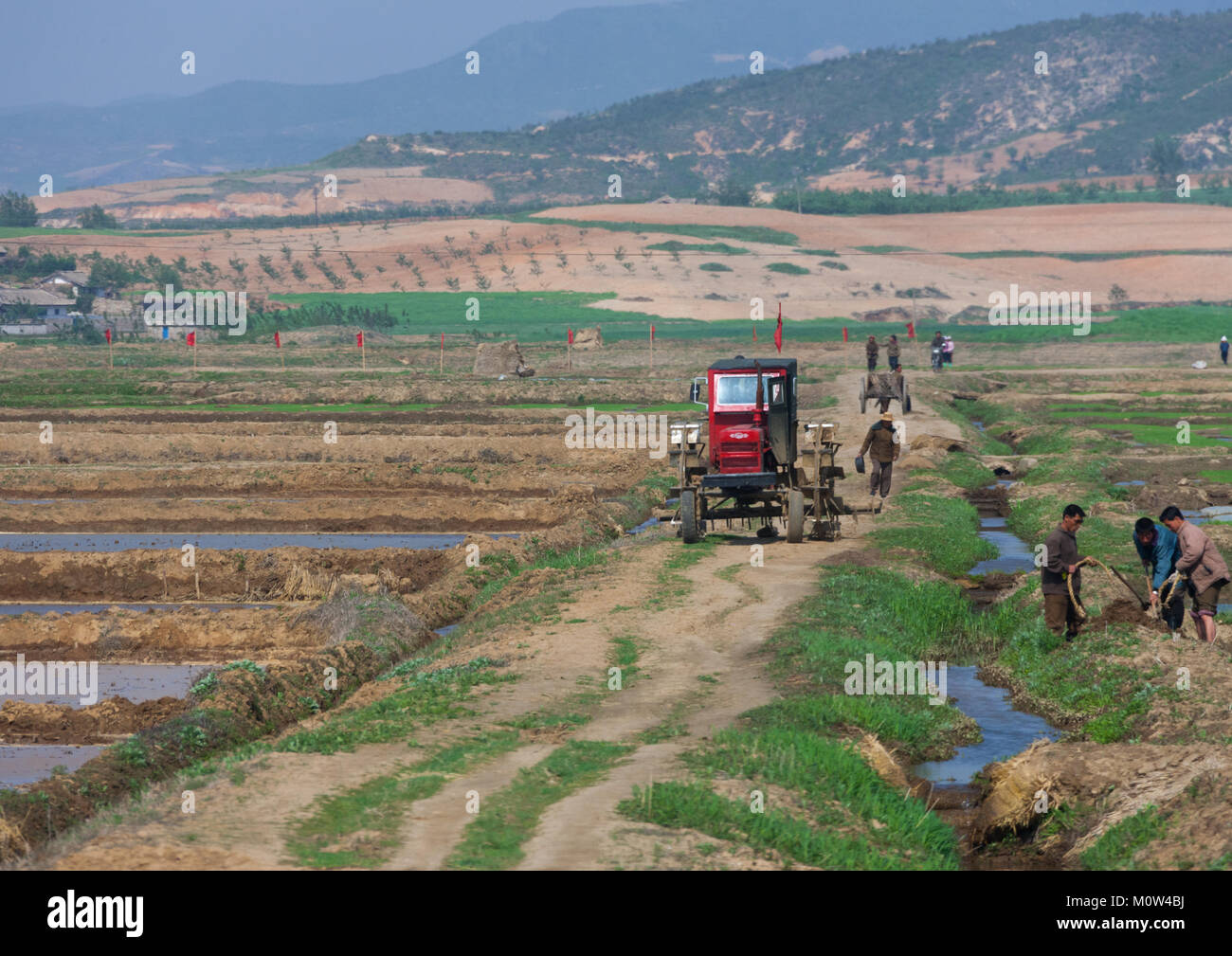 Old North Korean tractor in a field in the countryside, Pyongan Province, Pyongyang, North Korea Stock Photo
