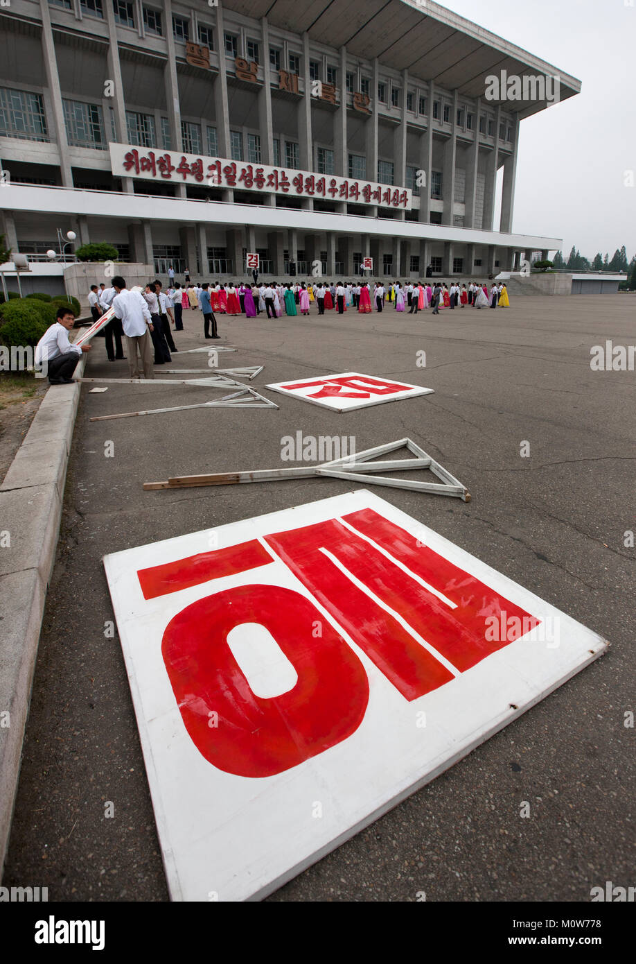 Propaganda billboards during a mass dance performance on september 9 ...