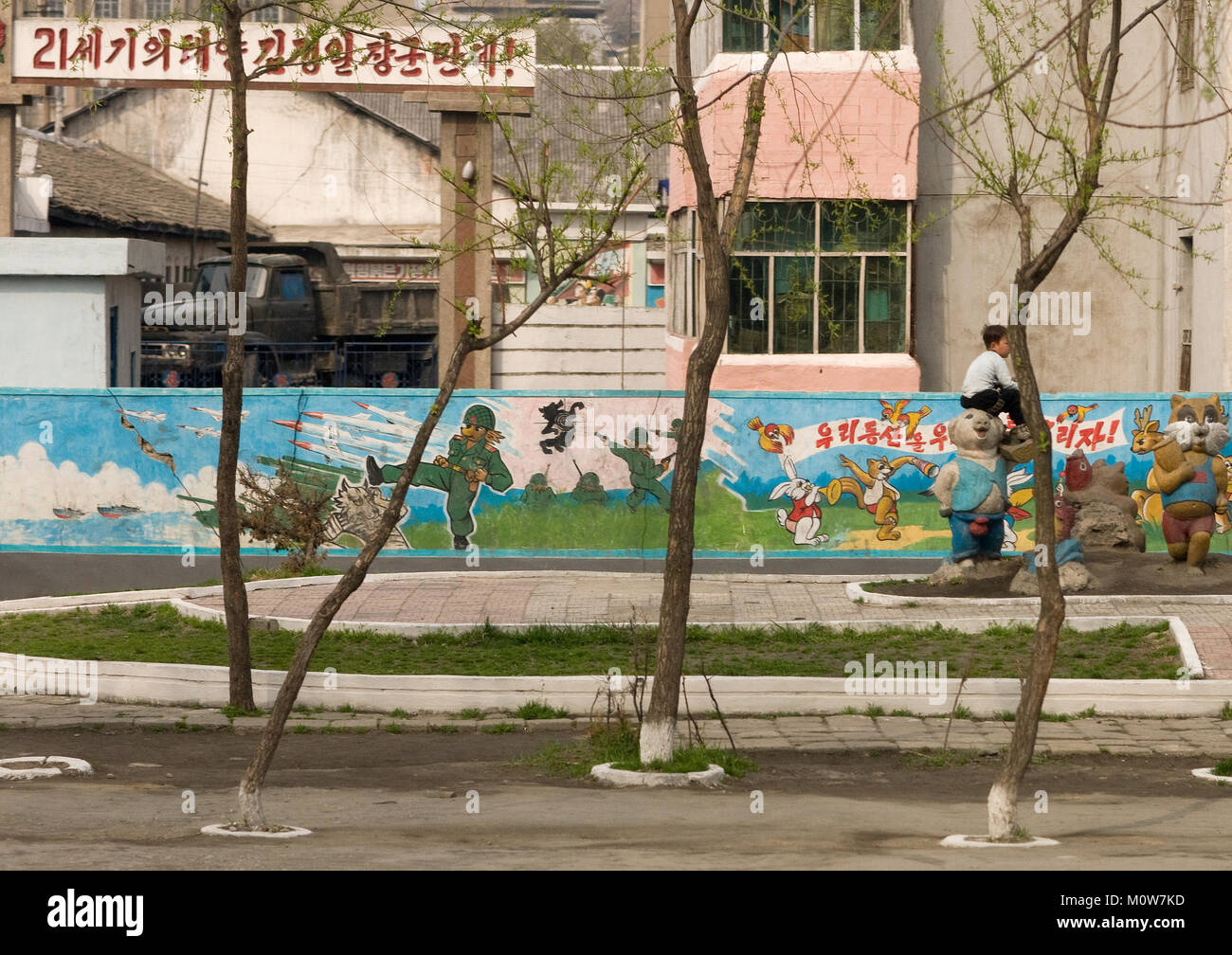 North Korean children playground with propaganda billboards, Kangwon Province, Wonsan, North Korea Stock Photo