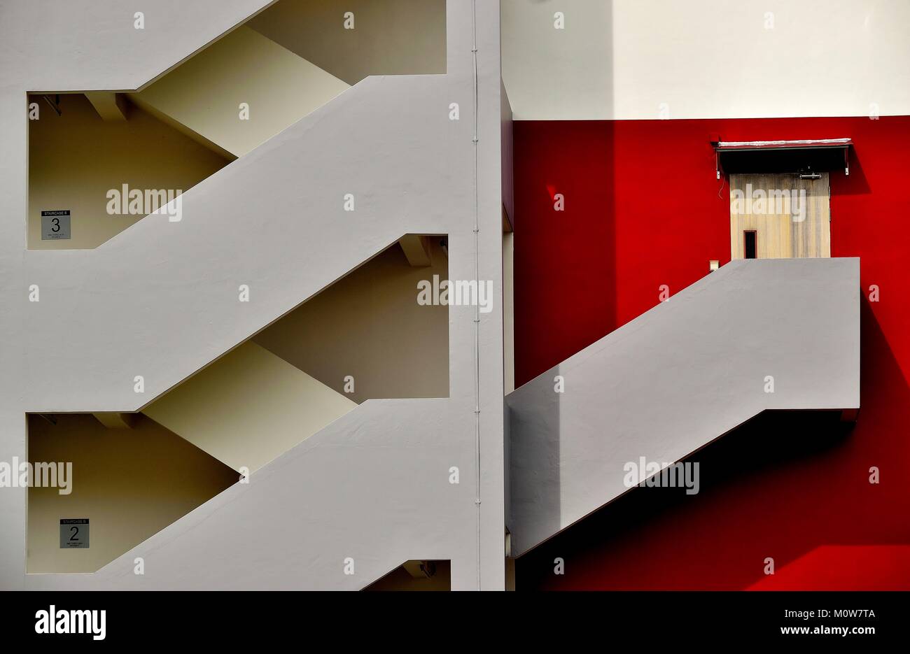 Bold exterior of a modern factory with exterior staircase in Singapore Stock Photo