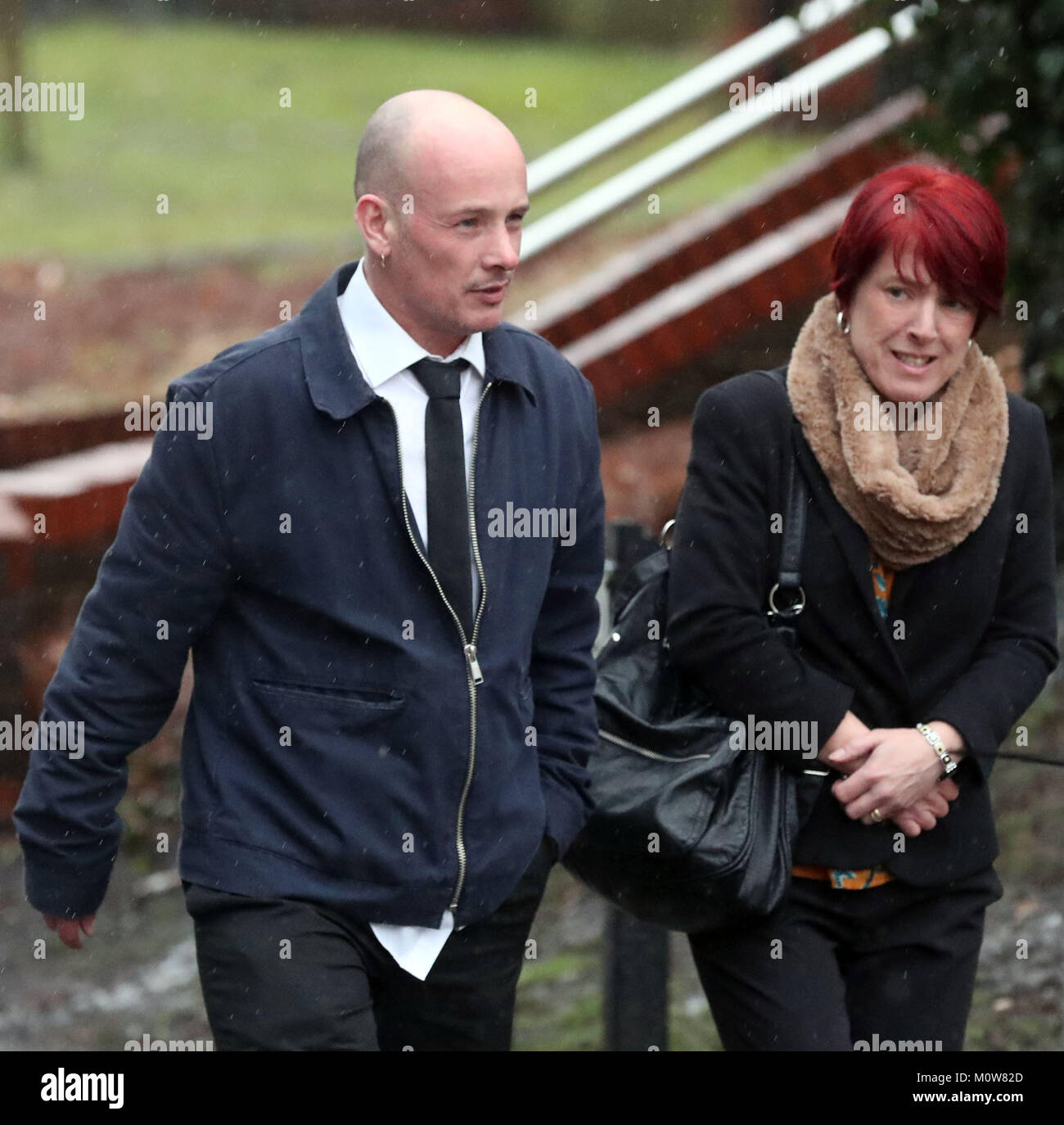 Tracy Lewis and Tony Benton, the sister and twin brother of Sean Benton, arrive at Woking Coroner's Court on the first day of the inquest into the 1995 death of Private Benton at Deepcut army barracks. Stock Photo