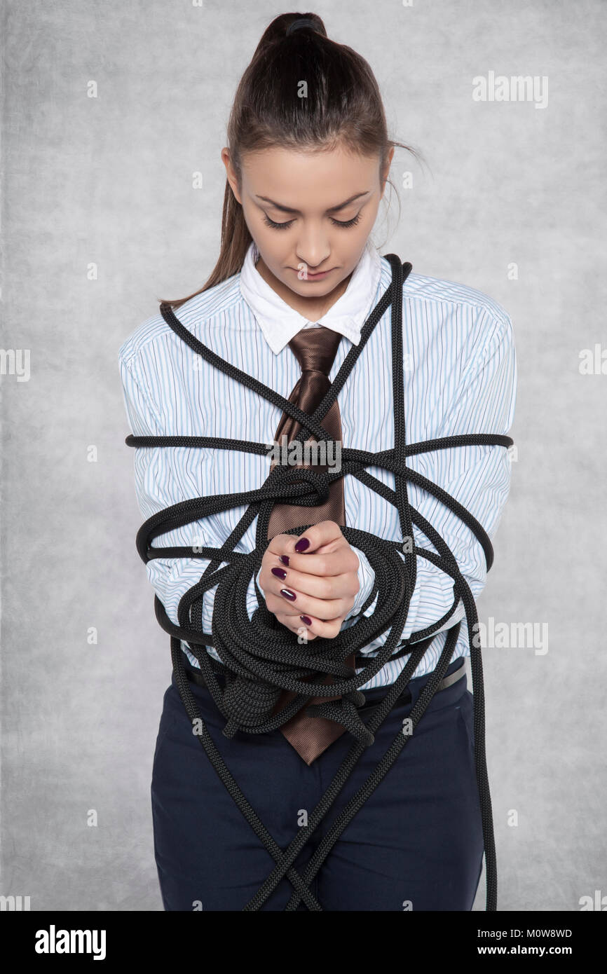 business woman tied up when trying to bribe Stock Photo - Alamy