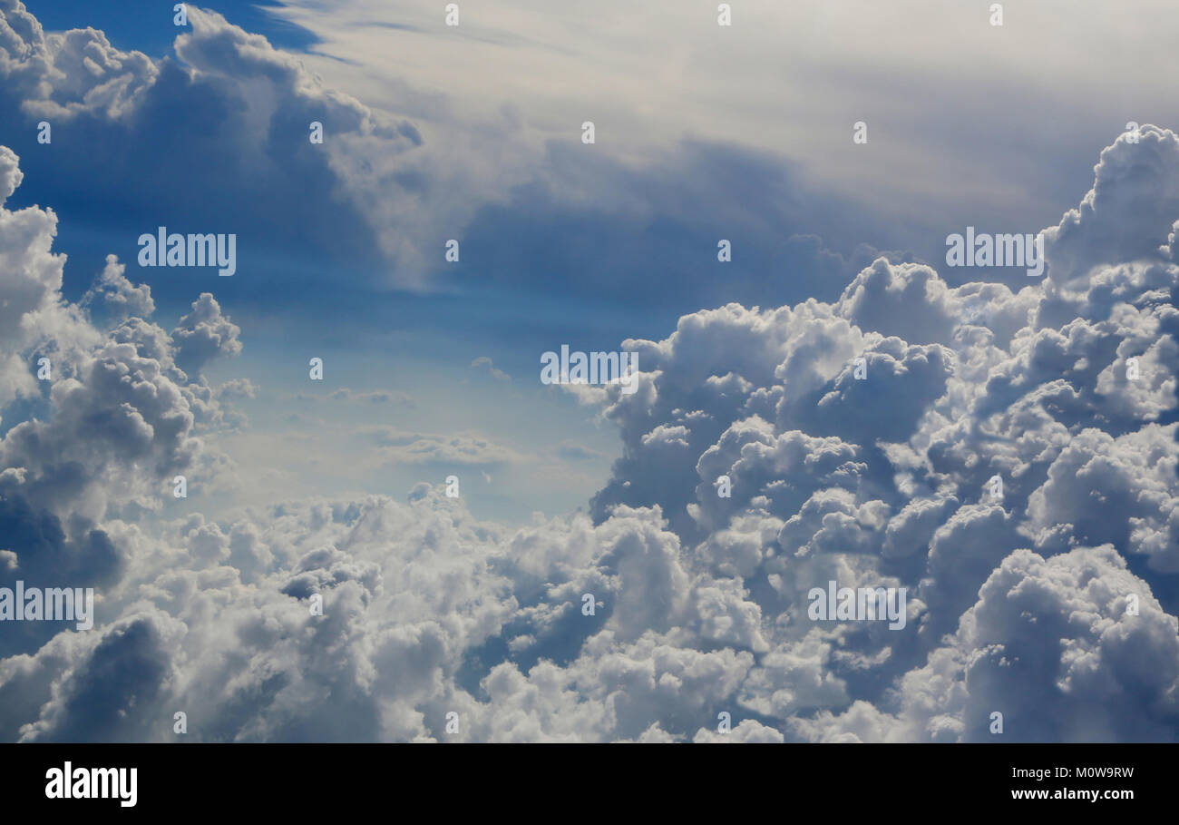 The blue sky with the cumulus clouds lit with the sun Stock Photo - Alamy