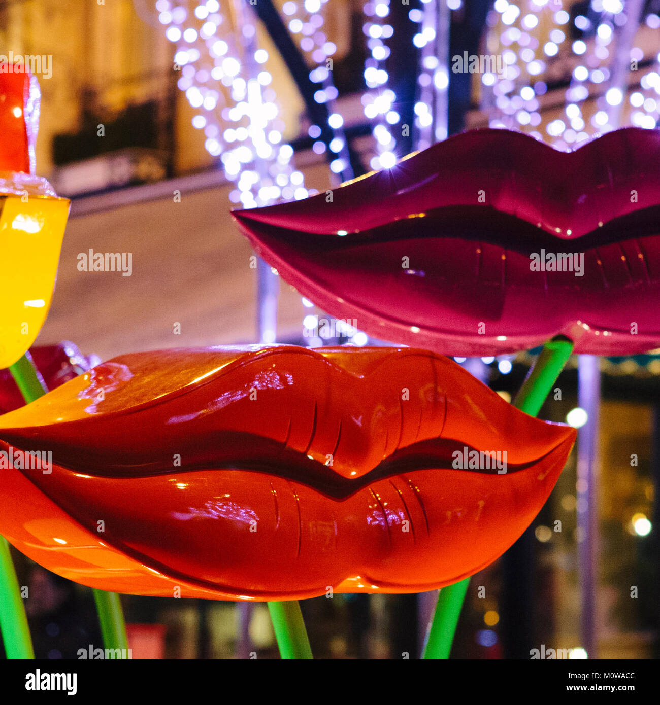Lips fountain at night - Stravinsky fountain in Paris with beautiful colourful lips, December 2011. Close up, extreme close up, colourful. Stock Photo