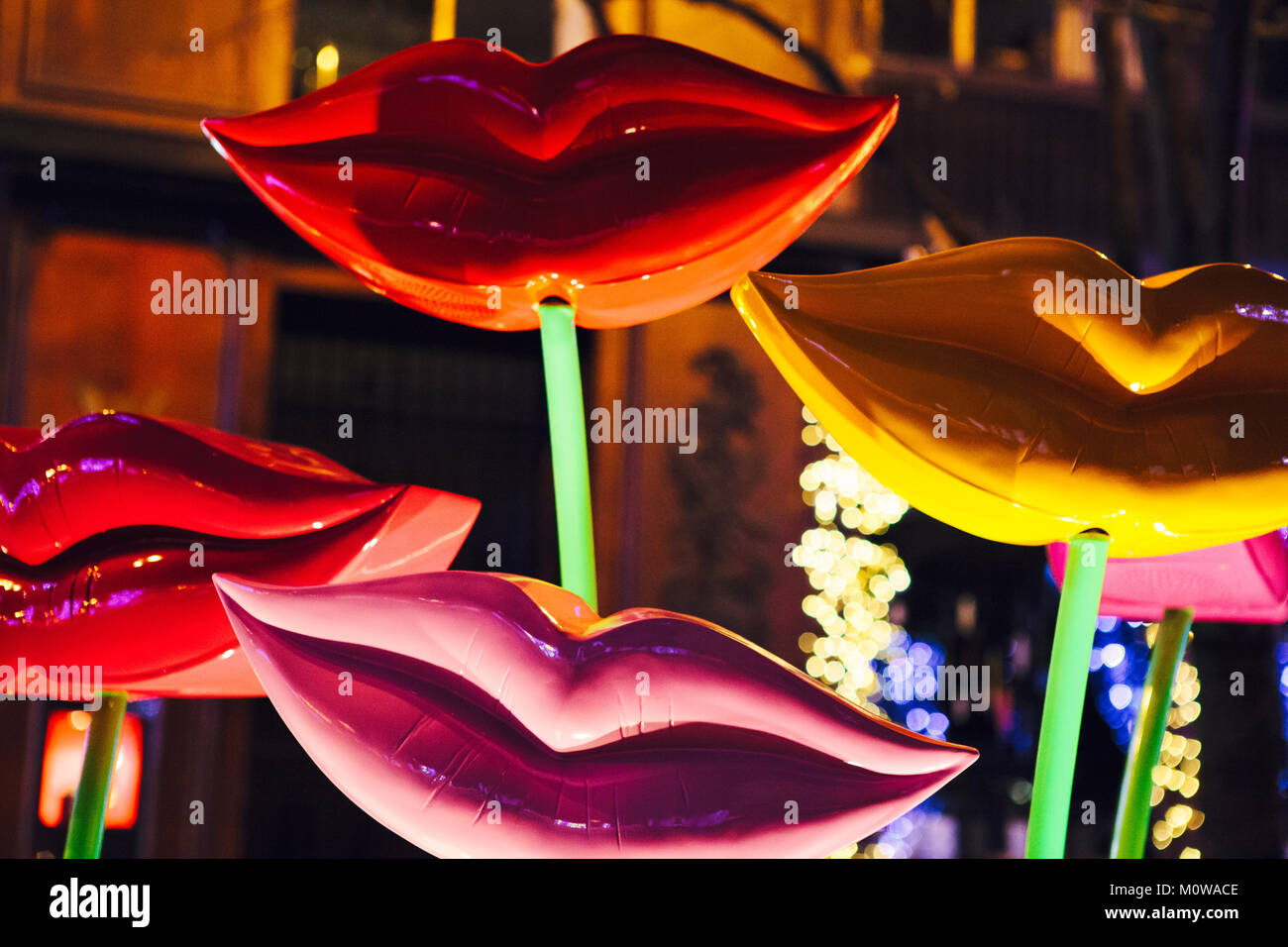 Lips, Les Levres - image of a famous Stravinsky fountain in Paris with beautiful colourful lips at night, close up, December 2011. Stock Photo