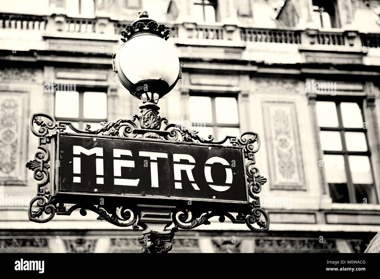 Art nouveau Paris subway underground entrance sign on a beautiful Stock