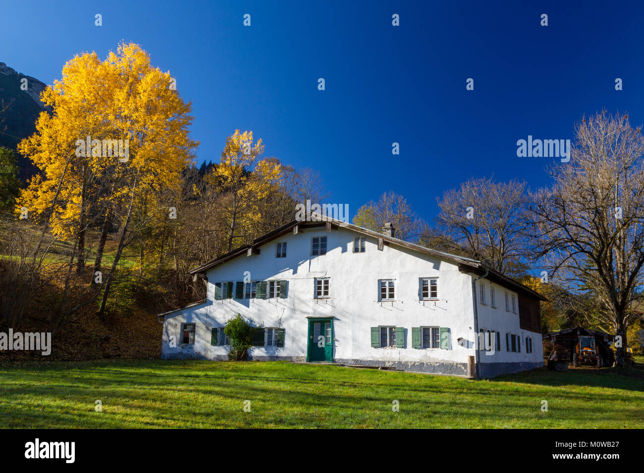 Old farm building in autumn near Pfronten in Allgäu, Bavaria, Germany. Stock Photo