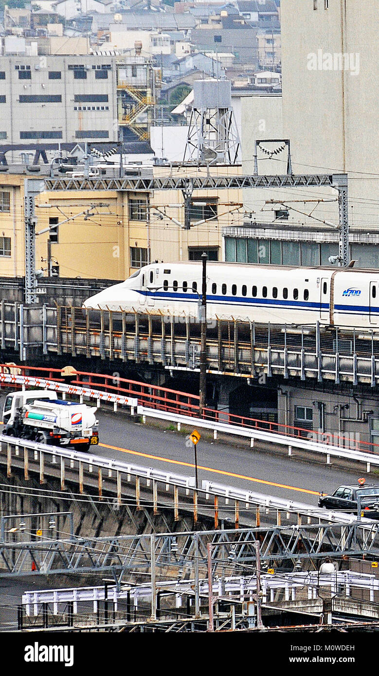 Shinkansen train leaving Kyoto railway station  Japan, Stock Photo