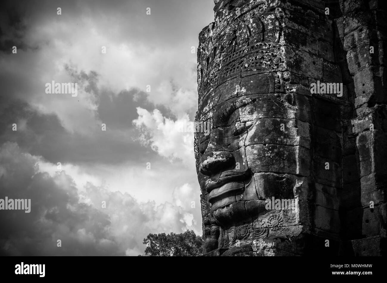 Closeup the Stone face of Ancient Bayon Temple at Angkor Thom. Siem Reap, Cambodia Stock Photo