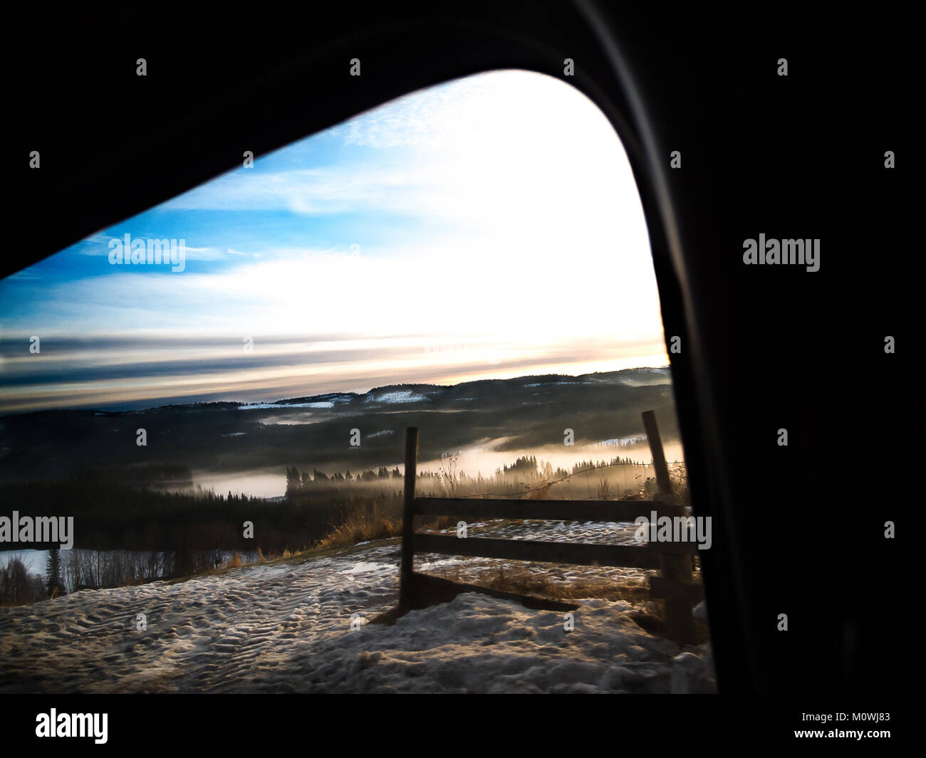 Sunrise over misty valley in hi-res stock photography and images - Alamy