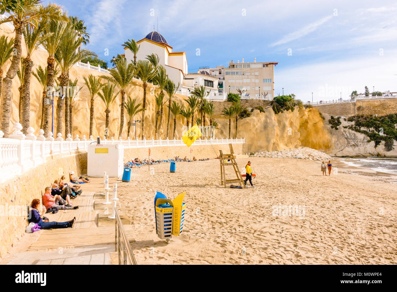 Benidorm, Spain - January 14, 2018: People enjoying holiday in Cala Mas ...