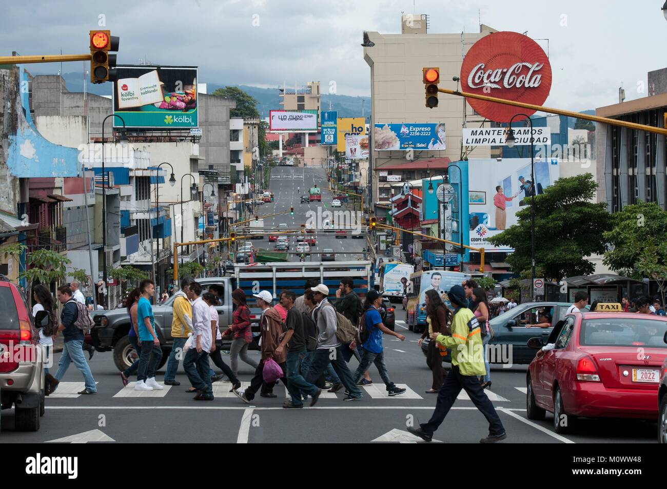 Costa Rica,San Jose Province,San Jose,pedestrians crossing a city road Stock Photo