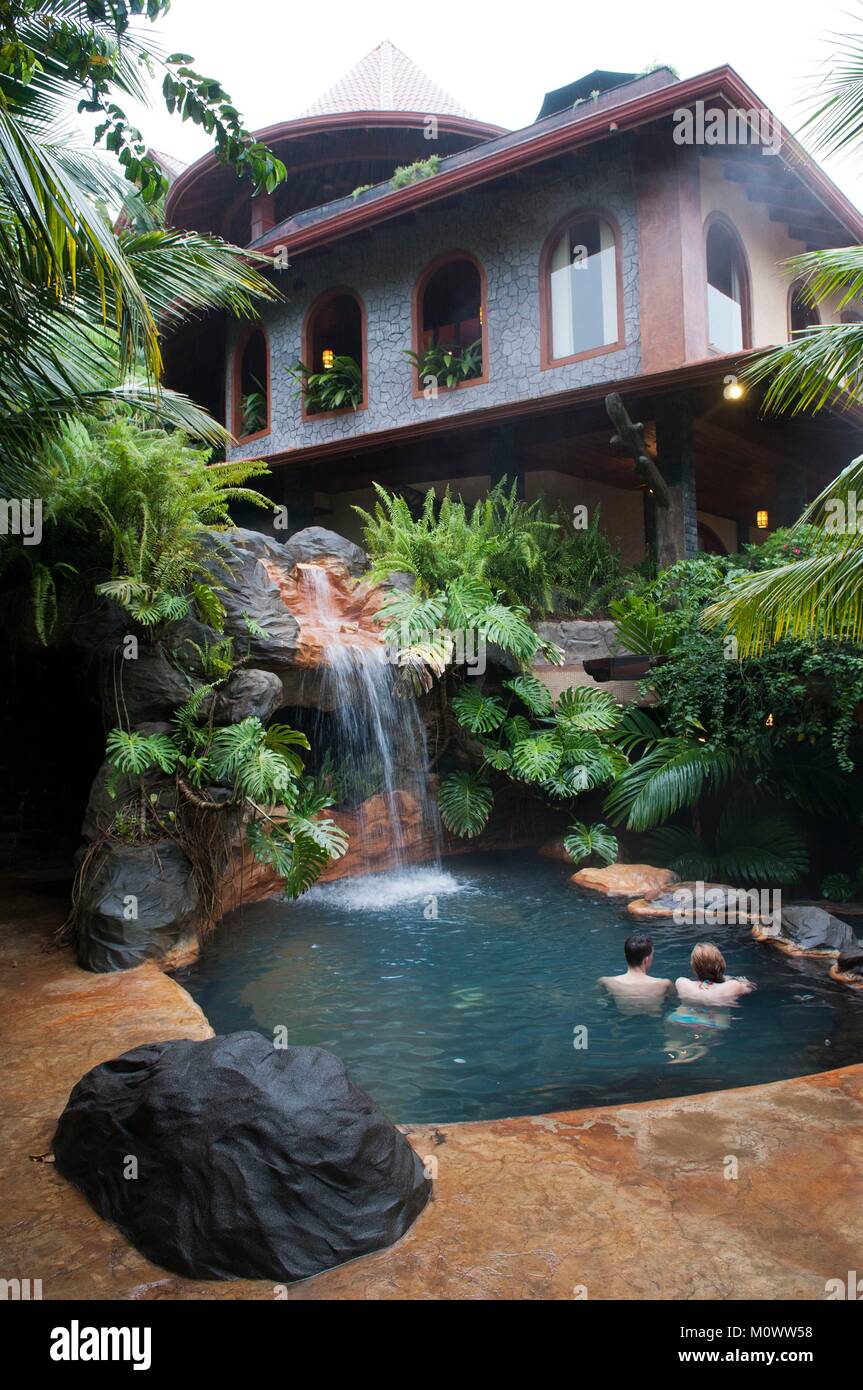 Costa Rica,Alajuela Province,La Fortuna,hotel the springs resort and spa,bathing in a natural hot spring Stock Photo