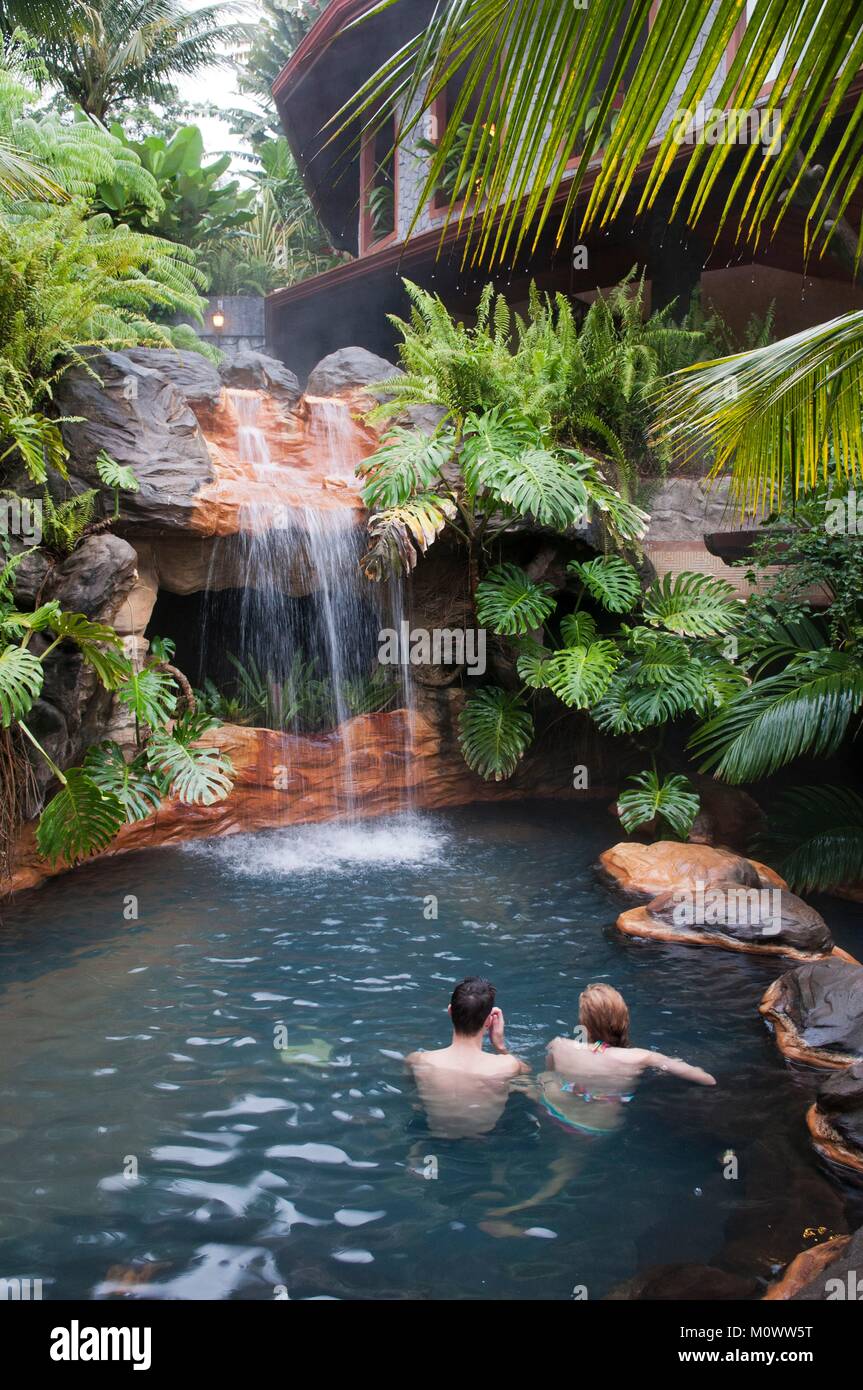 Costa Rica,Alajuela Province,La Fortuna,hotel the springs resort and spa,bathing in a natural hot spring Stock Photo