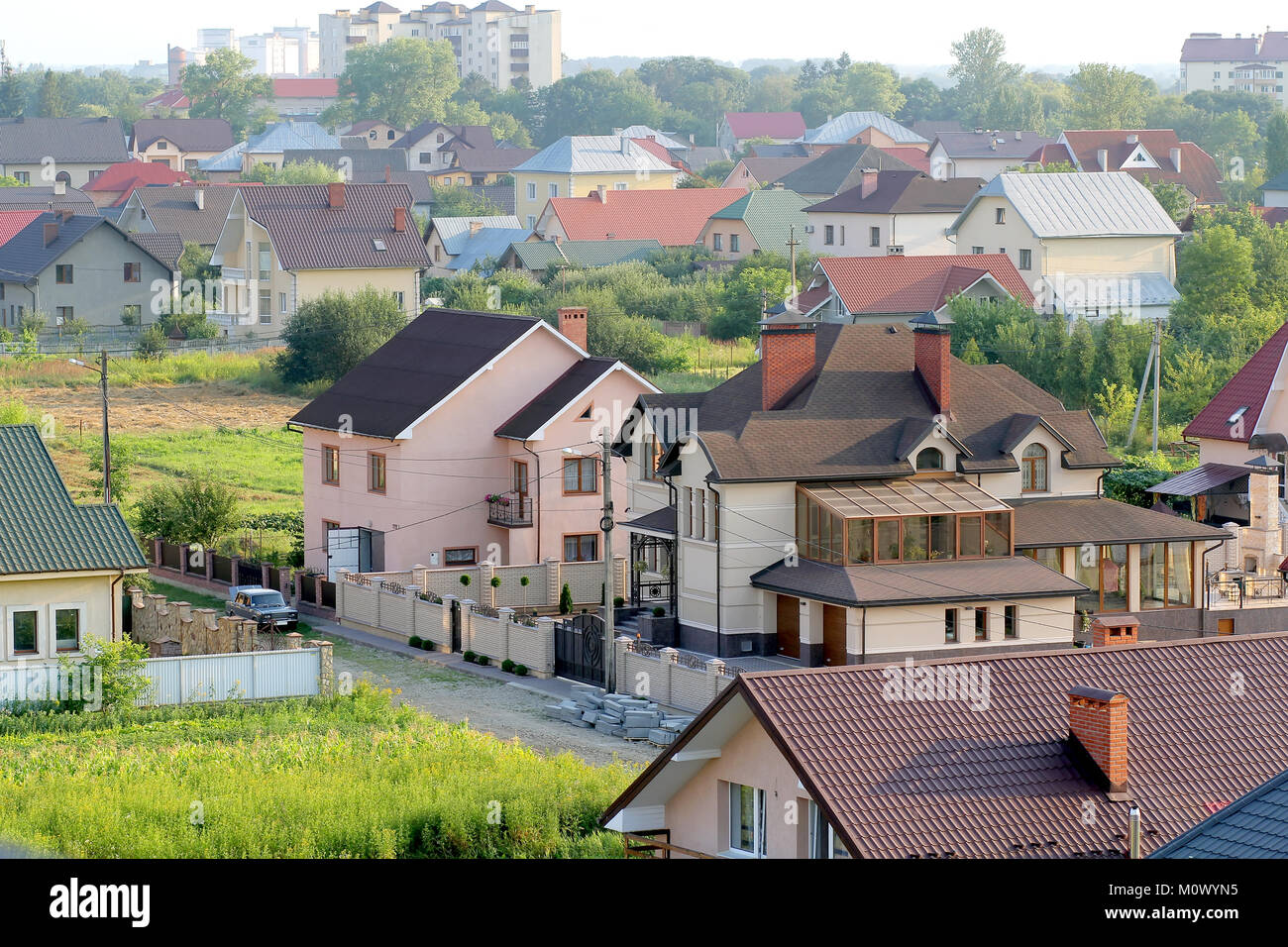 Aerial view of new modern residential houses. Comfortable buildings in countryside. Stock Photo