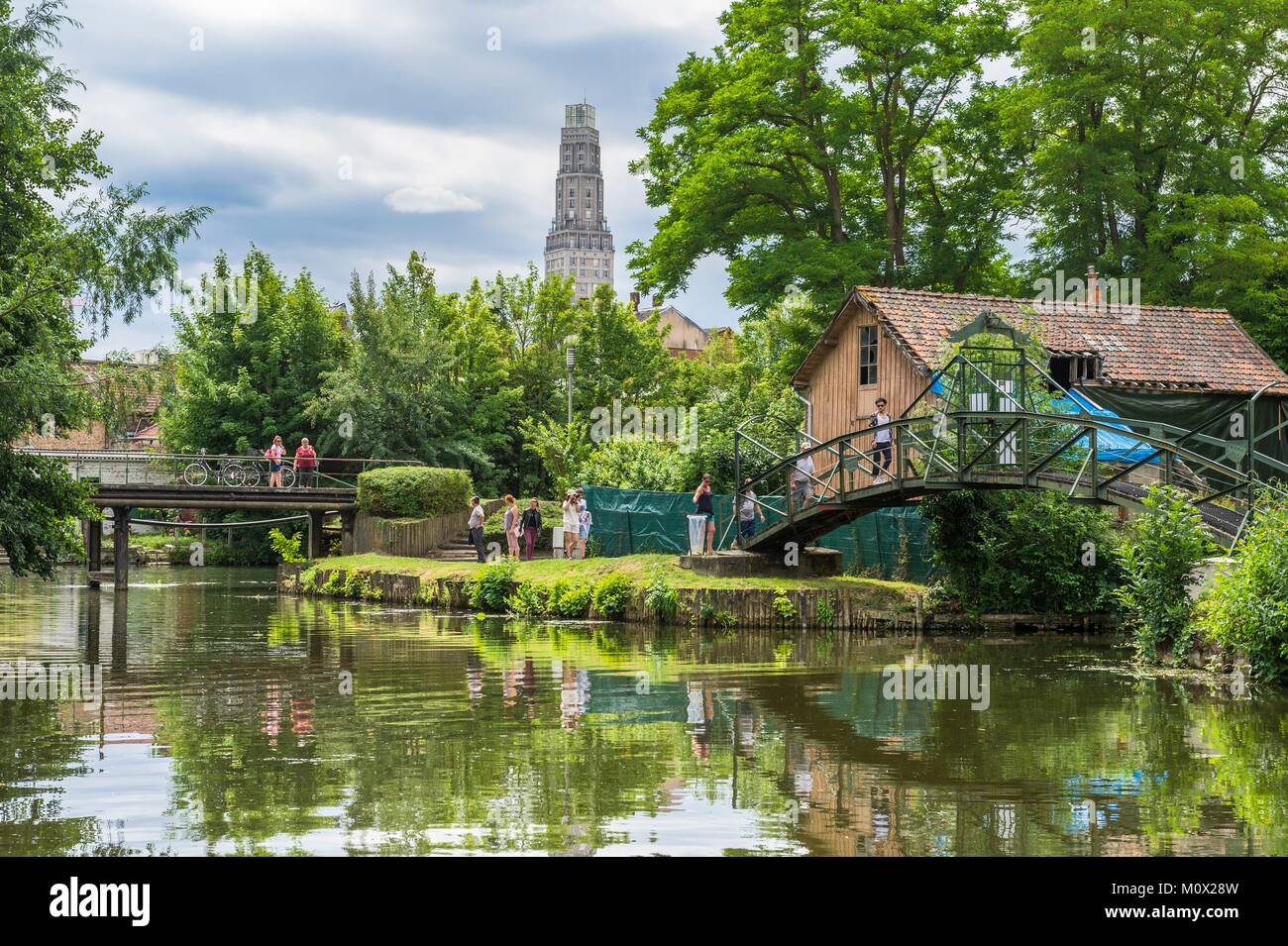 France,Somme,Amiens,the Hortillonnages are old marshes filled to create a  mosaic of floating gardens surrounded by canals,environmental initiation  centre on Ile aux Fagots,Perret Tower in the background Stock Photo - Alamy