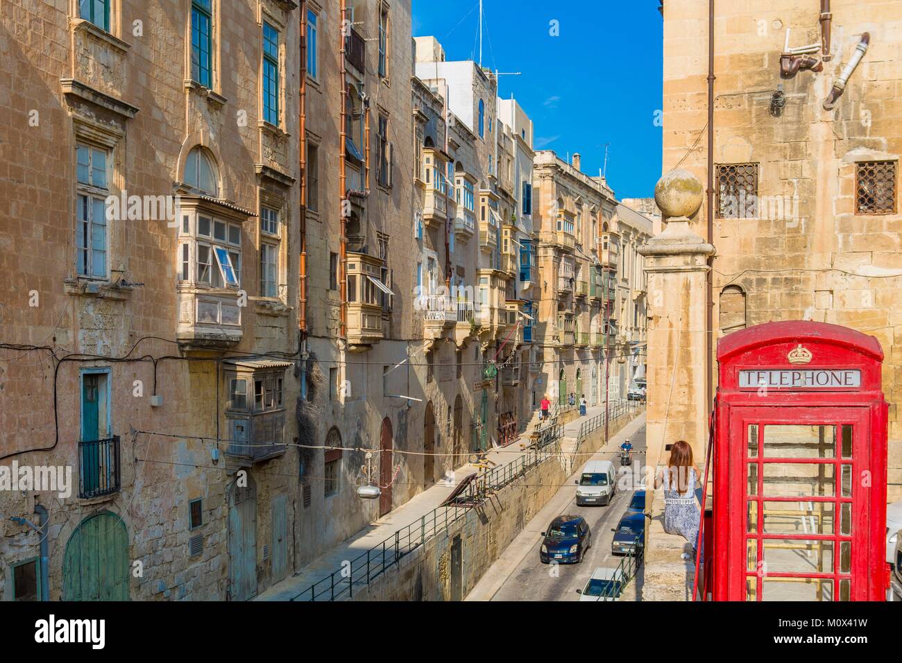 Malta,Valletta,listed as World Heritage by UNESCO,city centre,typical alleyway and telephone booth Stock Photo
