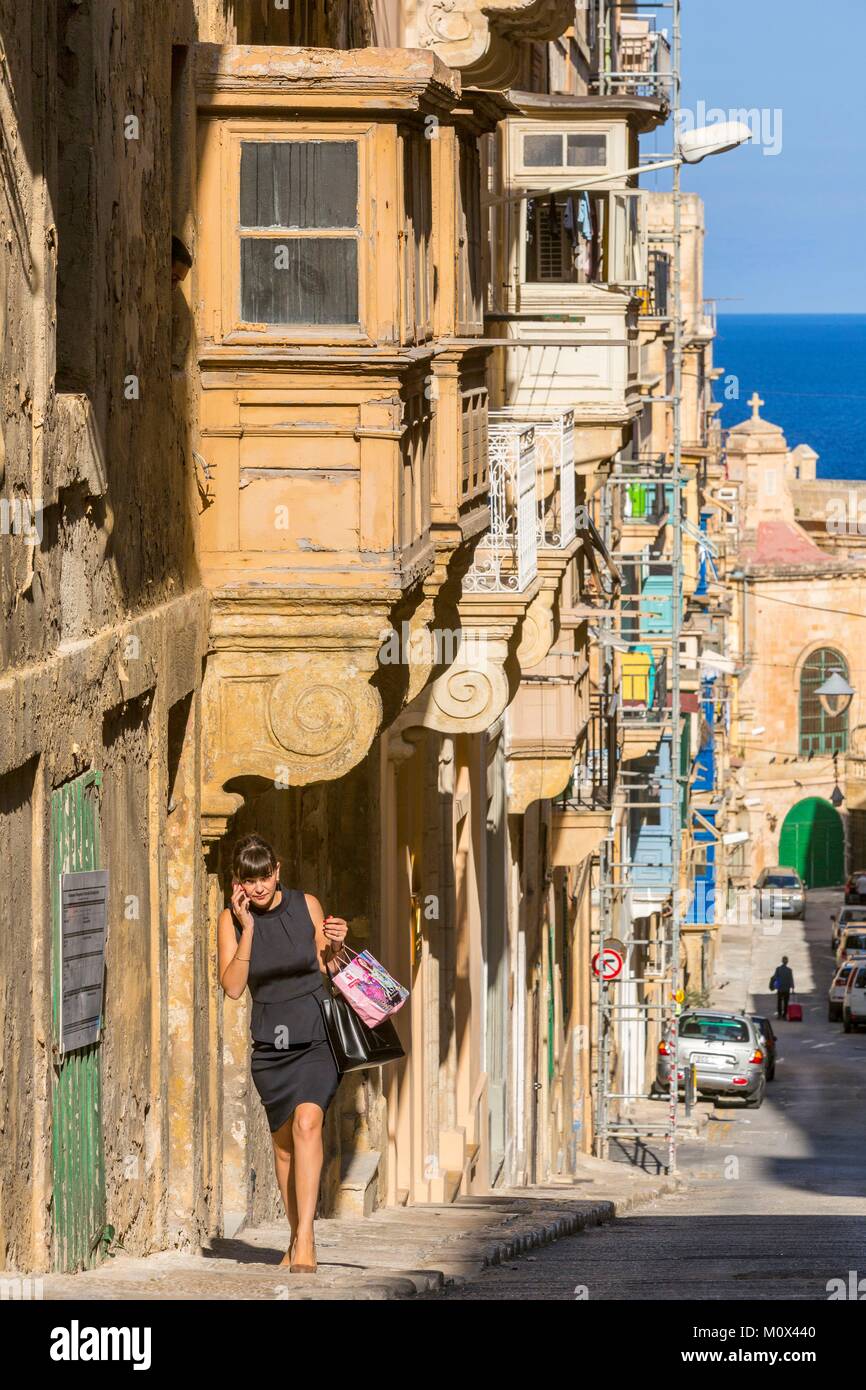 Malta,Valletta,city listed as World Heritage by UNESCO,typical lanes of the city centre with bow-windows or wooden balconies Stock Photo