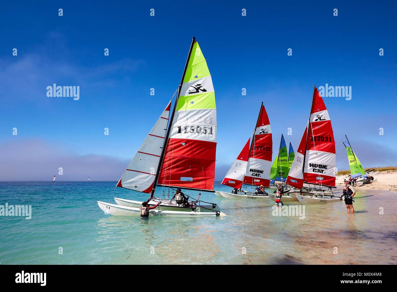 France,Finistere,Fouesnant,Archipelago Glenan (Glenan islands),Penfret Island,nautical catamaran of the sailing school of Glénans on the beach Stock Photo