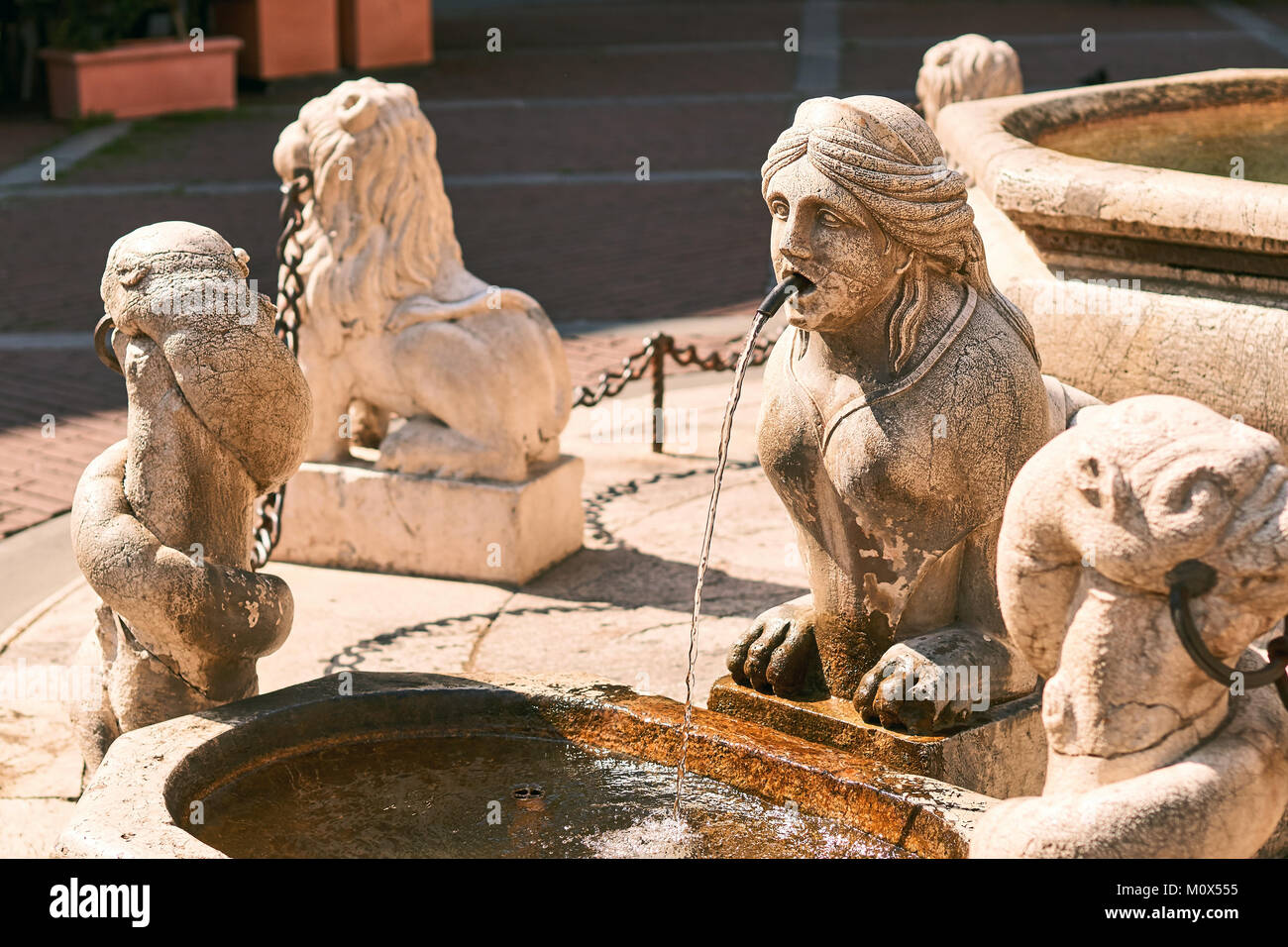 Old fountain at Piazza Vecchia in Bergamo, Italy Stock Photo