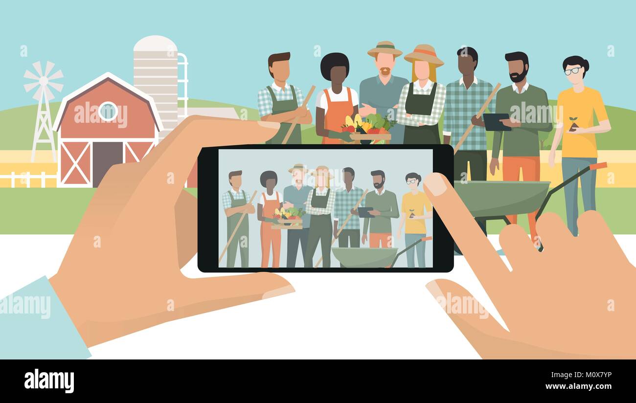 Multi-ethic group of farmers posing together at the farm, a man is taking a portrait using a smartphone, subjective point of view Stock Vector